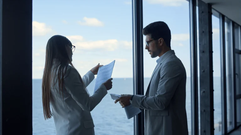 professional maritime lawyer consulting with a client aboard a ship