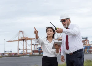 Maritime lawyer reviewing vessel records and voyage data logs.