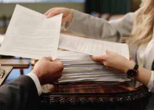 Woman reviewing maritime statute of limitations documents for seamen and offshore workers